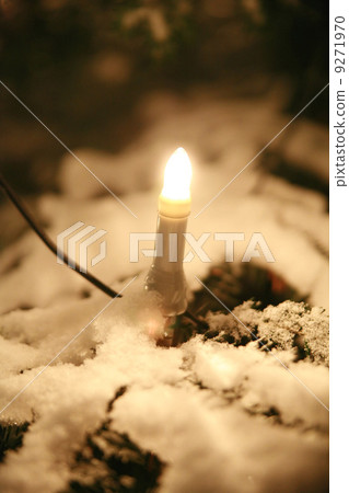 Christmas tree outside with candle lights 9271970