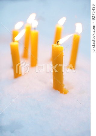 Yellow Candles In Snow 9275459