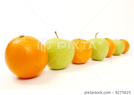 Apple and Oranges mixed in a row 9275625
