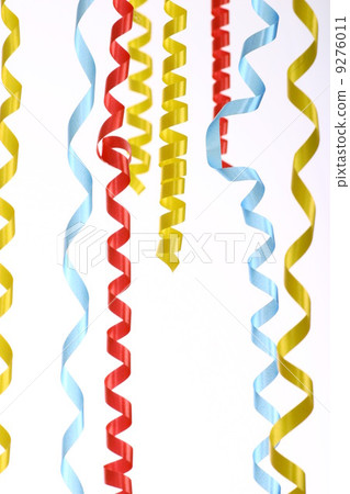 Celebratory Tinsel Of Red, Green And Yellow Color On White Celebratory Tinsel Of Red, Green And Yellow Color On White 9276011