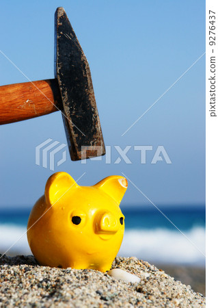 piggybank at beach vacation 9276437