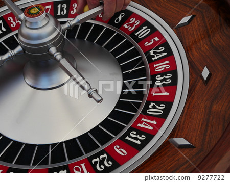 playing with chips at a roulette table 9277722