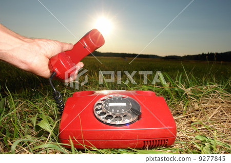 hotline phone in beautiful landscape outside 9277845