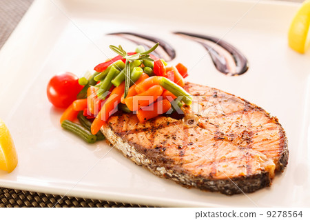 salmon steak with vegetables salmon steak with vegetables 9278564