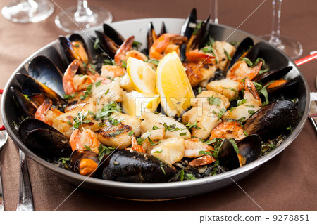 seafood paella in the fry pan seafood paella in the fry pan 9278851