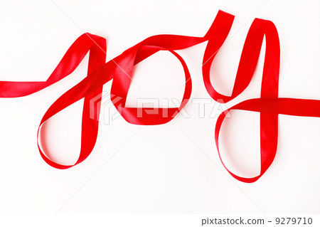 Joy word written in red ribbon on white background Joy word written in red ribbon on white background 9279710