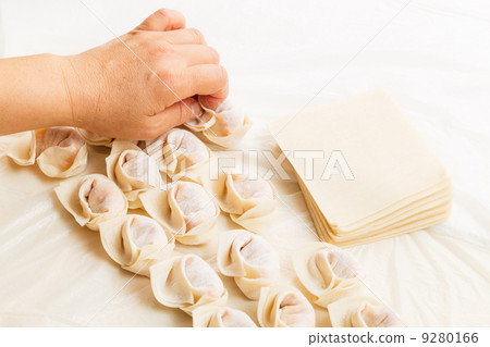 Homemade dumpling with human hand 9280166