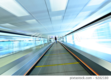 moving escalator with person 9282180