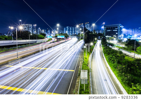Busy traffic on highway at night Busy traffic on highway at night 9283336