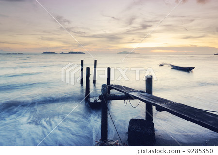 Wooden jetty during sunset Wooden jetty during sunset 9285350