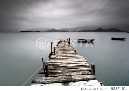 wooden peer with boat 9287461