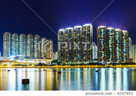 Apartment building in Hong Kong at night Apartment building in Hong Kong at night 9287493
