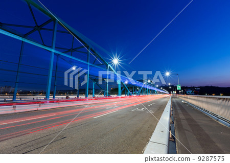 Busy traffic on highway at night Busy traffic on highway at night 9287575