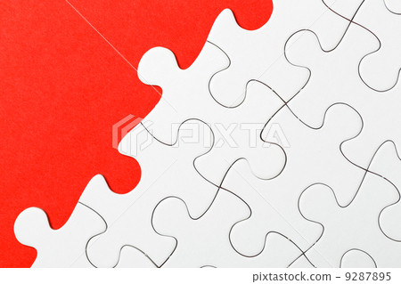 Incomplete puzzle in red color Incomplete puzzle in red color 9287895