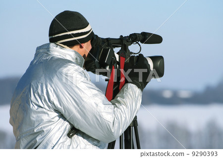 The journalist with a videocamera The journalist with a videocamera 9290393