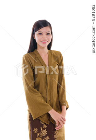young muslim woman with traditional dress on white background 9291082