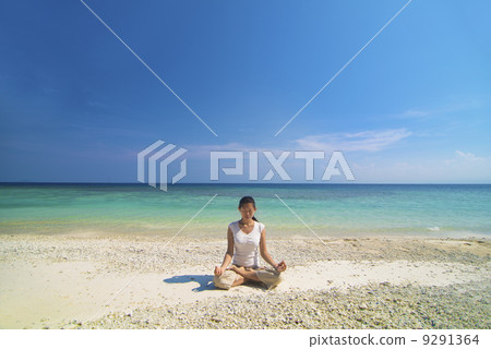 asian female performing beach yoga asian female performing beach yoga 9291364