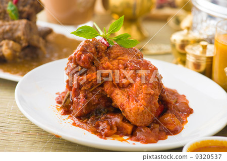 curry chicken rendang cooked in indian style with spicy sauce an 9320537