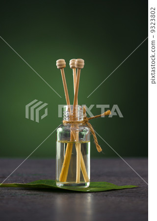 aromatherapy fragrance  oil on a frangipani leaf 9323802