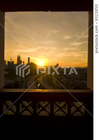 beautiful sunset view in kuala lumpur city from a window 9323950