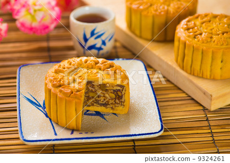 Mooncake for Chinese mid autumn festival foods. The Chinese word Mooncake for Chinese mid autumn festival foods. The Chinese word 9324261