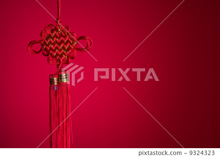 chinese new year knot during chinese new year with red backgroun 9324323