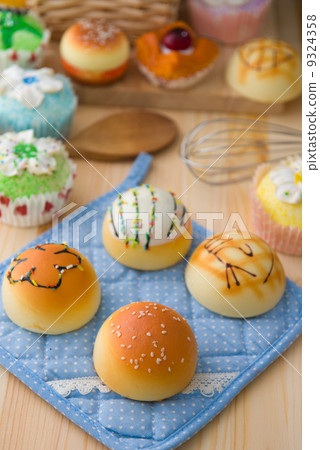 sweet vanilla bun cake bread with pastry decorations as backgrou sweet vanilla bun cake bread with pastry decorations as backgrou 9324358