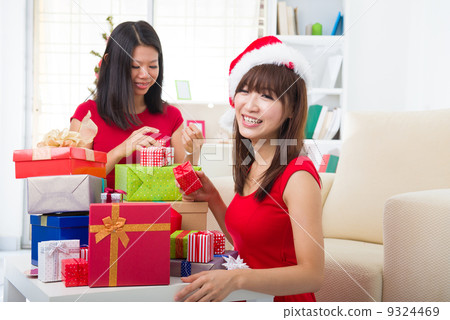 chinese friends during a christmas celebration chinese friends during a christmas celebration 9324469