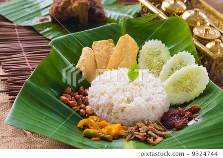 nasi lemak, a traditional malay curry paste rice dish served on 9324744