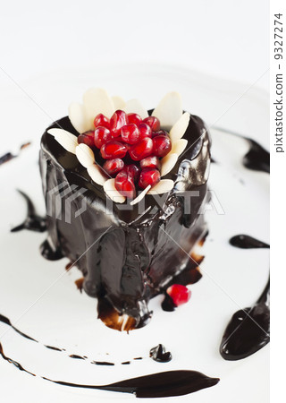 Cake Decorated with Pomegranate and Almonds 9327274