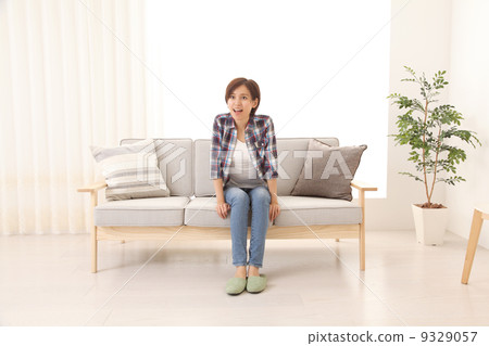 A woman in the room 9329057