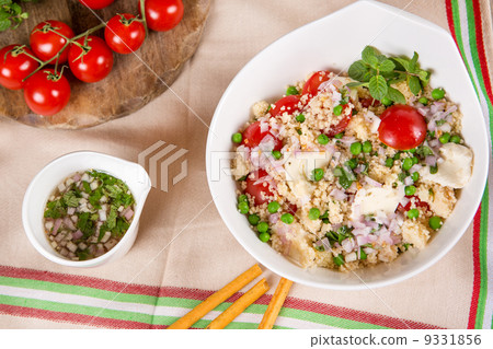 fresh couscous salad with vegetables 9331856