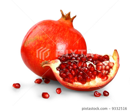 Ripe pomegranates with fruit section isolated on white Ripe pomegranates with fruit section isolated on white 9332516