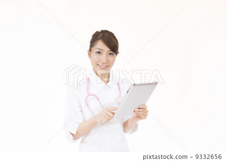 Nurse seeing electronic medical record Nurse seeing electronic medical record 9332656