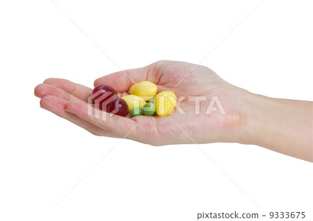 Fresh grapes, ginkgo and peas in hand isolated on white backgrou Fresh grapes, ginkgo and peas in hand isolated on white backgrou 9333675