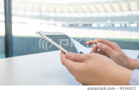 Tablet at stadium 9334023