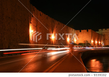 Medieval city walls in Rhodes town (night), Greece 9339102