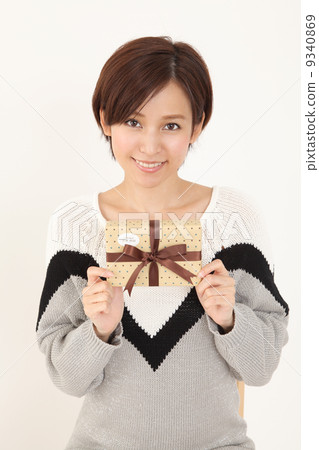 A woman with a present 9340869