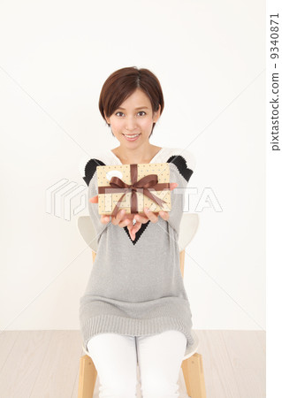A woman with a present 9340871