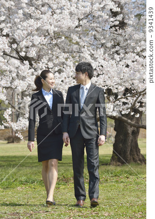A young businessman under a cherry tree 9341439