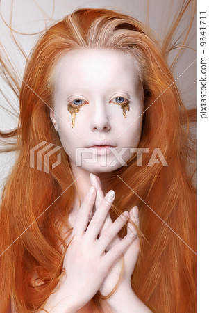 Masquerade. Redhead Woman with Futuristic Make-up. Fantasy 9341711