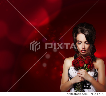 Tenderness. Dreamy Woman with Bouquet of Flowers over Purple Background 9341715