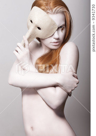 Burlesque. Naked Styled Woman Colored White with Venetian Mask Burlesque. Naked Styled Woman Colored White with Venetian Mask 9341730