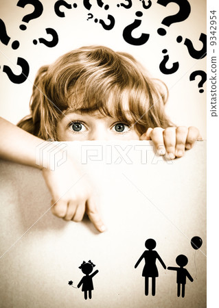 Child looking from behind the paper blank Child looking from behind the paper blank 9342954