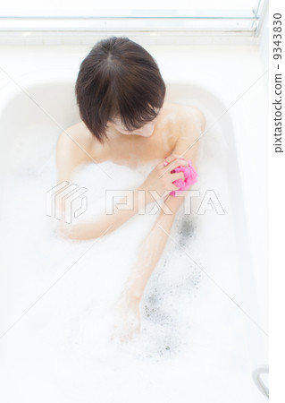 A girl taking a bath 9343830