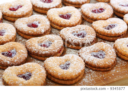 Linzer cookies with cherry jam. Linzer cookies with cherry jam. 9345877
