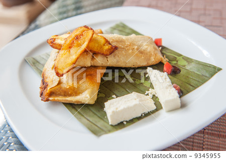 Tamales, traditional Mesoamerican dish Tamales, traditional Mesoamerican dish 9345955