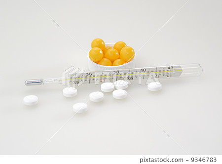 The thermometer, vitamins and pills The thermometer, vitamins and pills 9346783