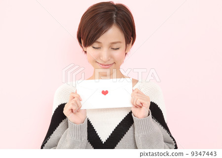A woman giving a letter A woman giving a letter 9347443