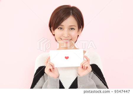 A woman giving a letter A woman giving a letter 9347447